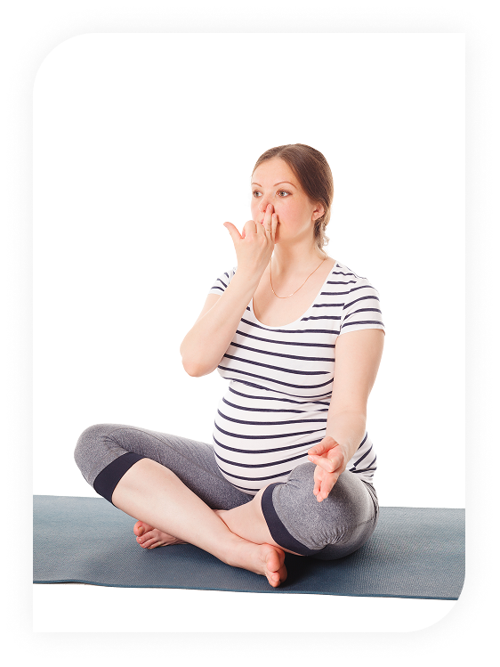 Pregnant woman practicing breathing