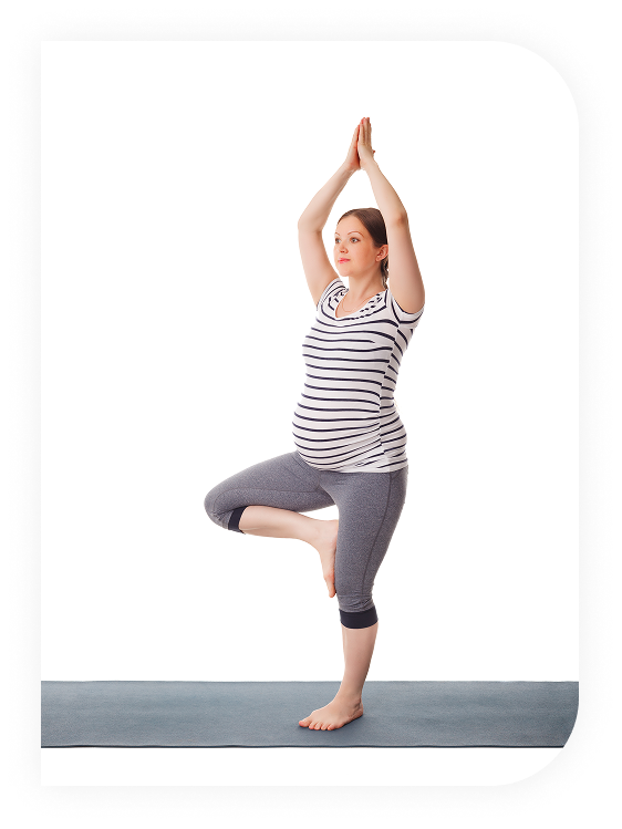 Pregnant woman in tree pose